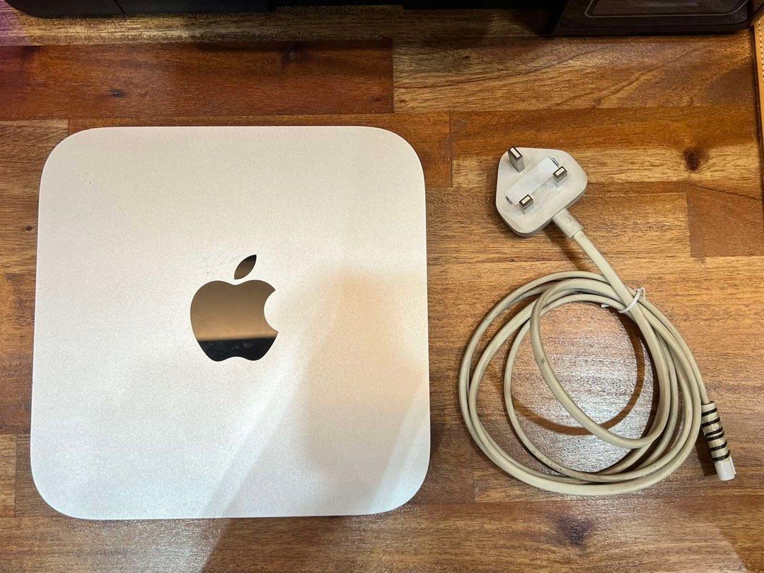 APPLE MAC MINI 2014 Model 500GB with Keyboard (Category: Desktops) located in Pasig City. Submitted by theclosetcasemanila (Listing ID 1289752344, Image 2). Description: 2014 model 500GB Hard drive 1.4 GHz Intel Core i5 4GB 1600 MHz DDR3 Intel HD Graohics 5000 1536MB Working. No issues. Updated to OSX Yosemite No damages or defects Light scratches and signs of use Bundling a free keyboard .