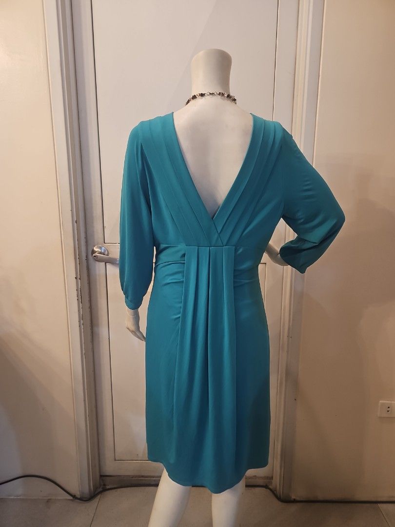 BCBG teal dress Large (Category: Dresses) located in Quezon City. Submitted by mercyotero8 (Listing ID 1289775638, Image 3). Description: large on tag stretchy fabric with satin feel merely tried on but never used shoulder 16 armpit 18 length 34.