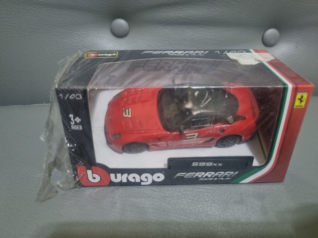 Burago Ferrari 599XX 1/43 (Category: Vehicle & Diecast Models) located in Silang. Submitted by samflores2k4t7 (Listing ID 1289739763, Image 1). Description: For sale Burago Ferrari 599XX Scale 1/43 Issue faded paint roof.