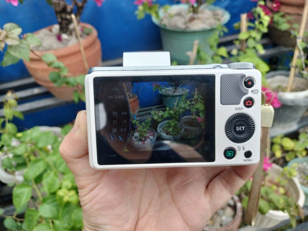 casio exilim ex- zr700 hs (Category: Cameras) located in Manila. Submitted by ultimogizmos (Listing ID 1289677766, Image 3). Description: The EX-ZR700 uses a 16.1 MP back-illuminated CMOS sensor, 3 inch LCD and a stabilized 18x, 25-450mm equivalent optical zoom lens. unit battery strap usb charging cable very slight vignette.