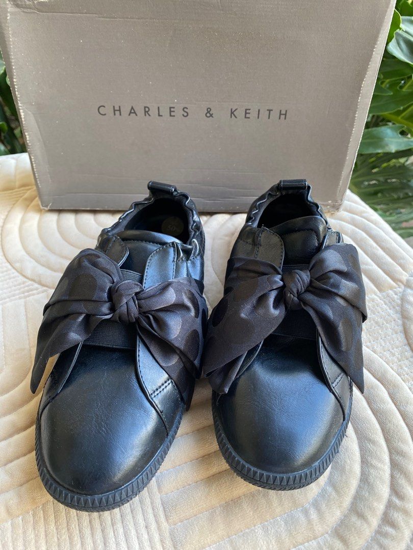 CHARLES & KEITH Sneakers (Category: Sneakers) located in Baliuag. Submitted by nylinel (Listing ID 1289683110, Image 1). Description: Charles & Keith Flats/ Covered/ Sneakers Style: CK1-70380700 Color: Black Size: 36 With box.