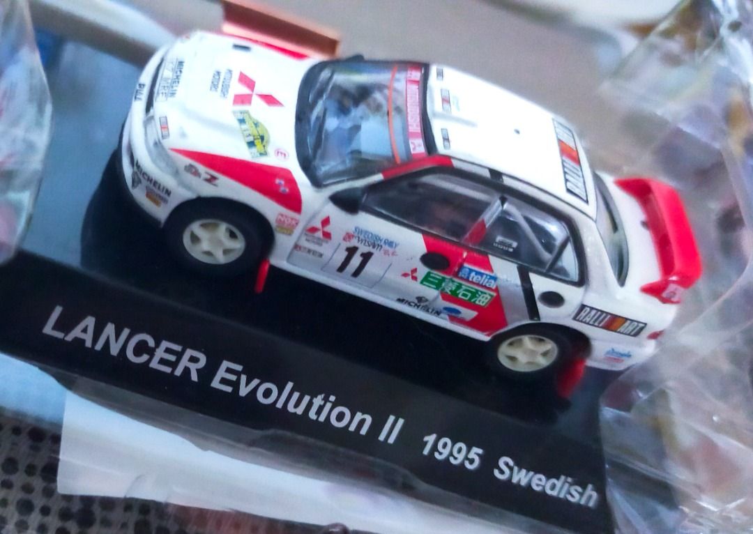 CMS MITSUBISHI LANCER EVOLUTION II 1995 SWEDISH RALLY CAR (Category: Vehicle & Diecast Models) located in Quezon City. Submitted by hobbyton74 (Listing ID 1289718553, Image 3). Description: BRAND : CMS SERIES : RALLY CAR COLLECTION MODEL : MITSUBISHI LANCER EVOLUTION II 1995 SWEDISH (WHITE/RED) SERIES : SS.7 SCALE : 1/64 CONDITION: BOX IS UNSEALED BUT ACTUAL ITEM IS INTACT AND UNUSED MADE IN CHINA .