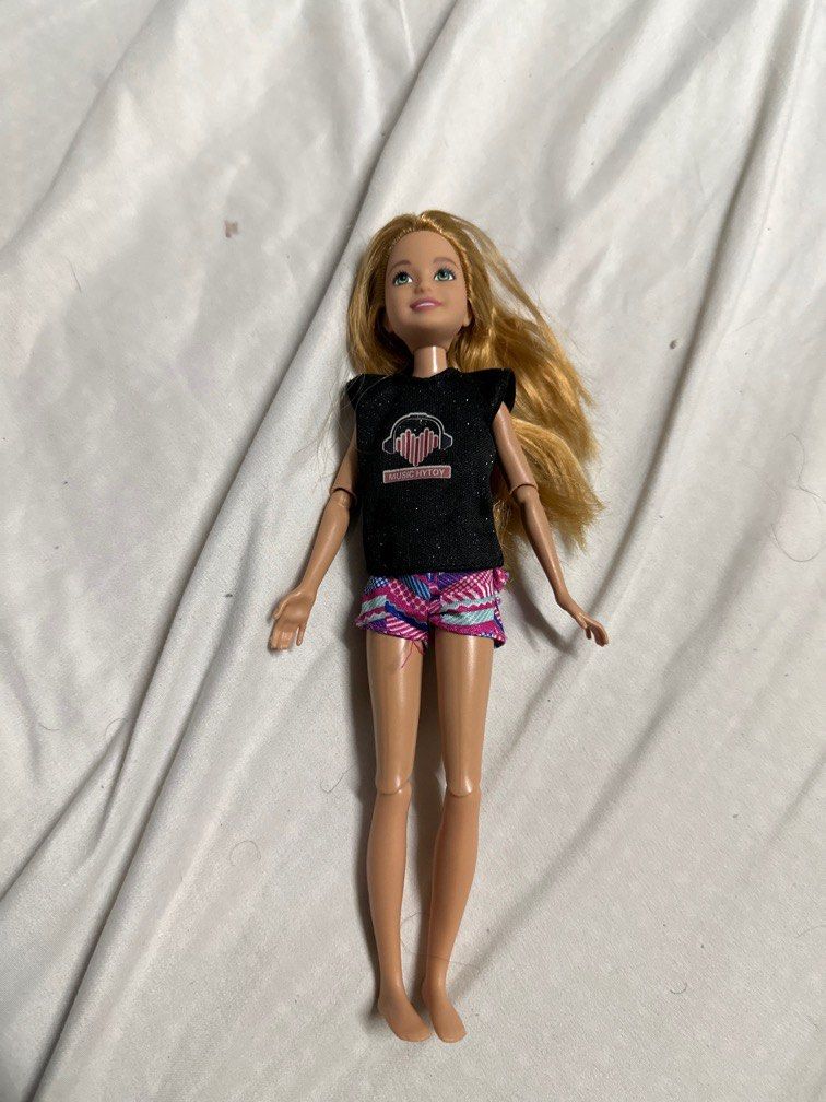 Fully articulated barbie skipper doll