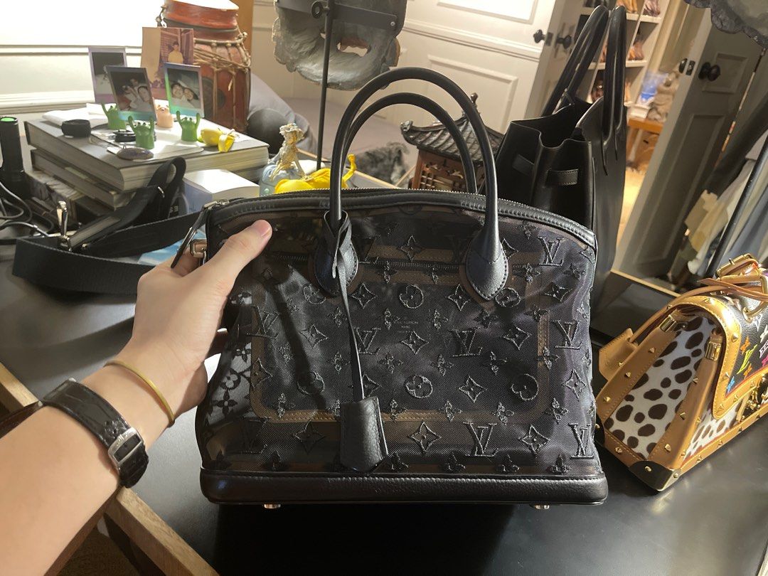 Louis Vuitton Limited Edition Transparence Lockit Bag (Category: Luxury Bags & Wallets) located in Mandaluyong City. Submitted by olachicoas (Listing ID 1289678828, Image 2). Description: 2012 Louis Vuitton Limited Edition Lockit Bag Nior (Black) Transparence Date Code: FO3172 30 cm L x 25 cm H x 15 cm D.
