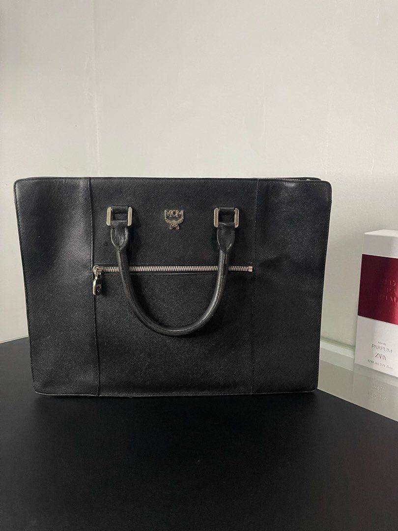 MCM Laptop bag (Category: Luxury Bags & Wallets) located in Manila. Submitted by tigris. (Listing ID 1289835133, Image 1). Description: Slightly negotiable pa Super mura na for an authentic MCM Bawal po sa maselan Preloved = with signs of use Can fit 13-14” laptop Without sling, but can give free improvised sling.