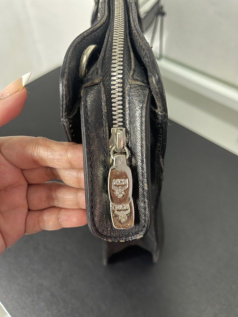 MCM Laptop bag (Category: Luxury Bags & Wallets) located in Manila. Submitted by tigris. (Listing ID 1289835133, Image 3). Description: Slightly negotiable pa Super mura na for an authentic MCM Bawal po sa maselan Preloved = with signs of use Can fit 13-14” laptop Without sling, but can give free improvised sling.