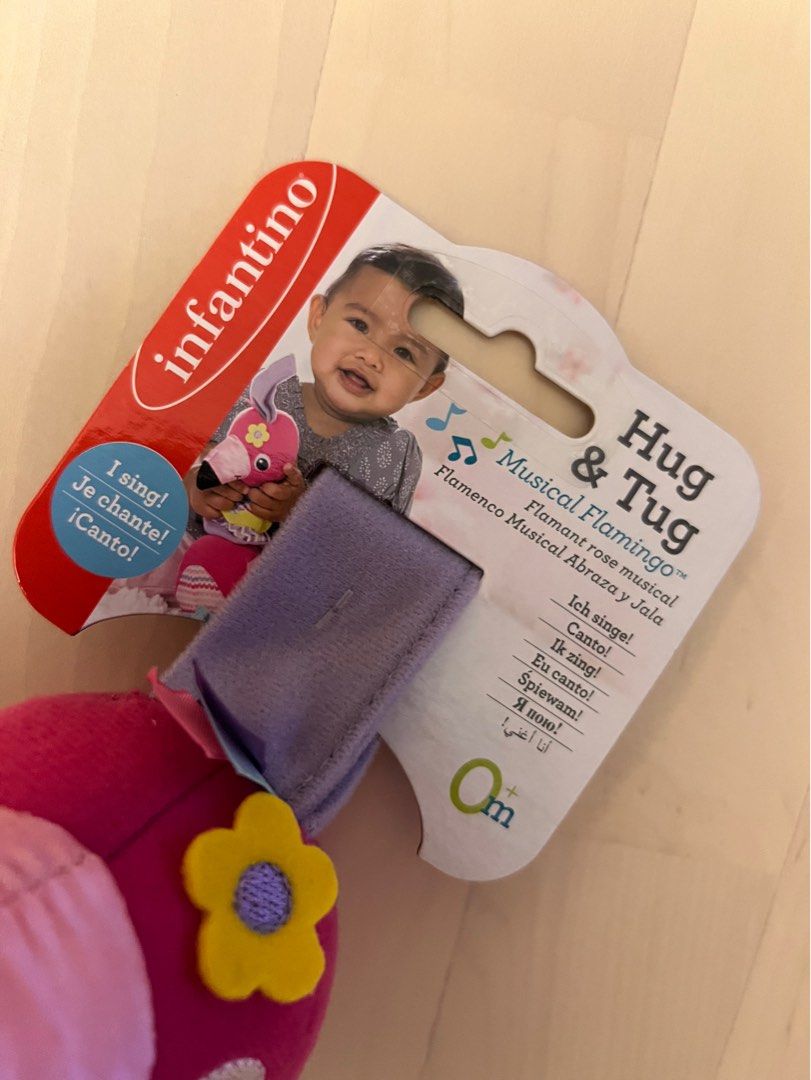 Infantino hug & cheap tug musical flamingo