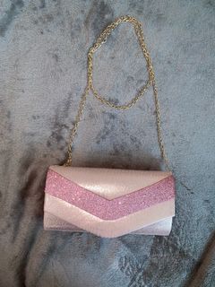 Pink sparkly formal clutch bag with chain