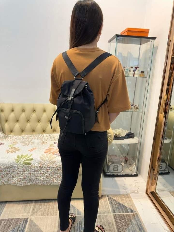 💋 PRADA Small Classic Logo Nylon & Leather Backpack Drawstring Bag (Category: Luxury Bags & Wallets) located in Clarin. Submitted by myclosetph143 (Listing ID 1289767862, Image 2). Description: PRADA Small Classic Logo Nylon & Leather Backpack Drawstring Bag 15,980 lp plus sf Guaranteed Authentic 💯 Small size Nylon and leather Rank A.