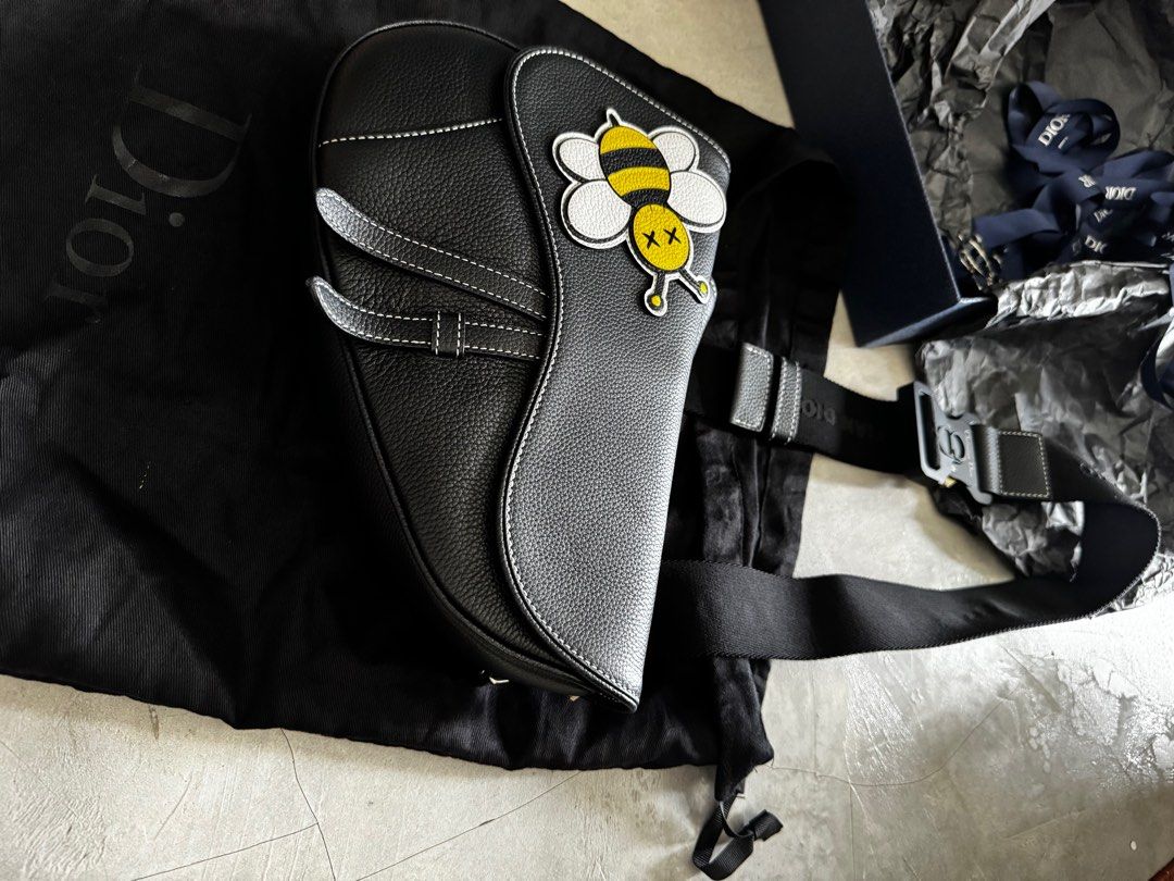 Dior kaws saddle bag discount