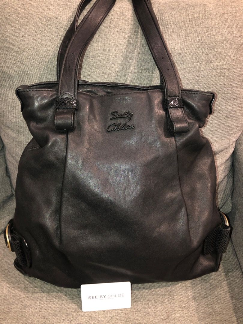 SEE by CHLOE Tote bag (Category: Luxury Bags & Wallets) located in Davao. Submitted by mliza1020 (Listing ID 1285640855, Image 1). Description: See by Chloe Tote bag. Black leather with Gold hardware. No flaws with authenticity card, code And holo sticker. Made in Tunisia.