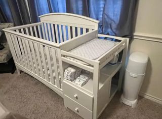 White Wooden Crib with drawers and diaper changing station