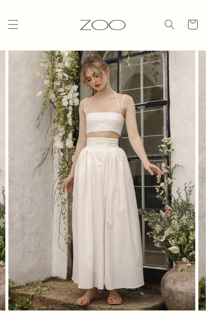Zoo Label Zeta Set (White - XS) (Category: Dresses) located in Bulacan. Submitted by vandeclutterx (Listing ID 1289754687, Image 2). Description: Used once only; last two photos are the actual photos Original price: Php4,290 Selling price: Php3,500 Size (in inches): Top: Bust 30-31 Skirt: Waist 25-26, Hip 32-33, Length 38 Zeta Set Bandeau Top and High Waist Baroque Style Midi Skirt (White Linen) from Zoo Label.