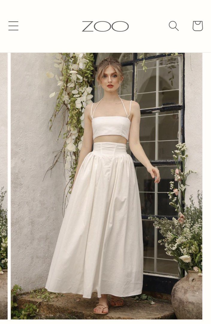 Zoo Label Zeta Set (White - XS) (Category: Dresses) located in Bulacan. Submitted by vandeclutterx (Listing ID 1289754687, Image 1). Description: Used once only; last two photos are the actual photos Original price: Php4,290 Selling price: Php3,500 Size (in inches): Top: Bust 30-31 Skirt: Waist 25-26, Hip 32-33, Length 38 Zeta Set Bandeau Top and High Waist Baroque Style Midi Skirt (White Linen) from Zoo Label.