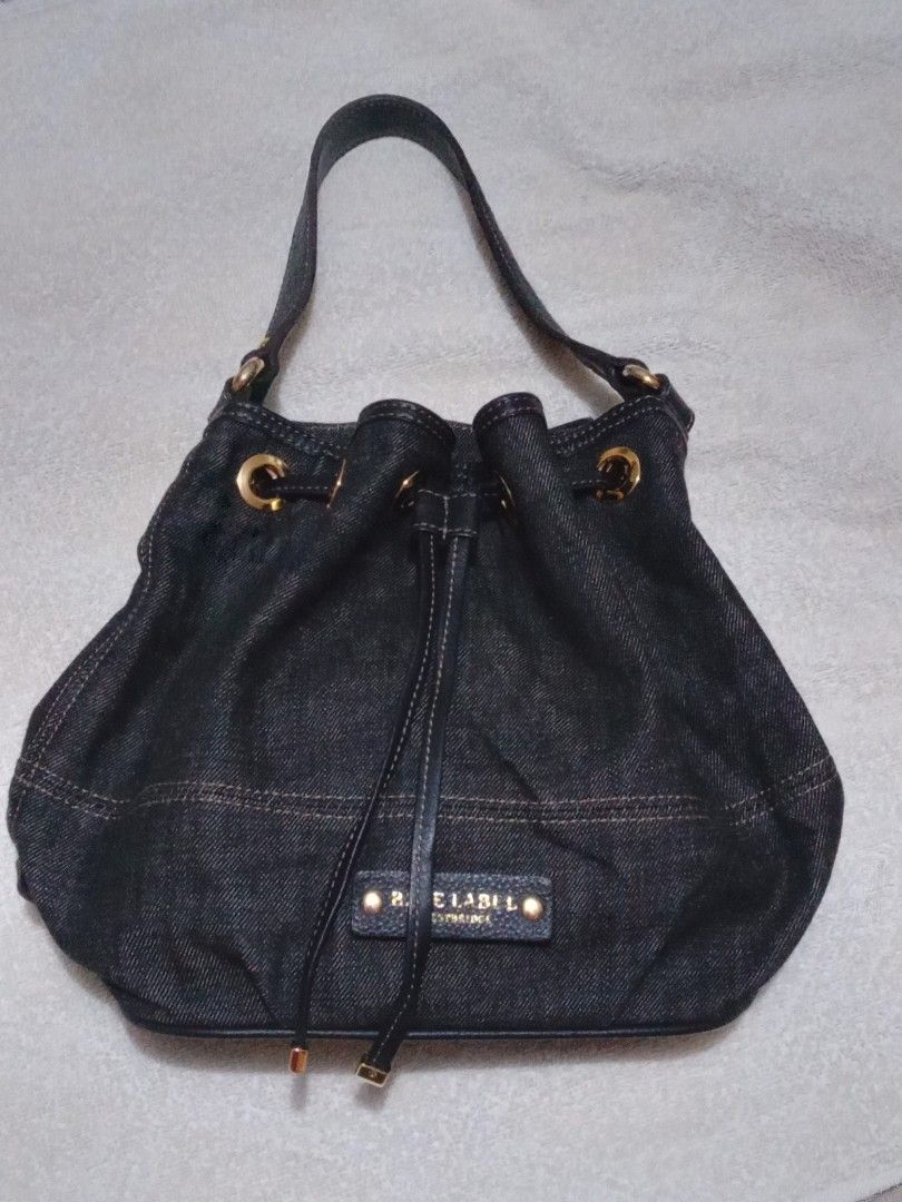 Burberry bucket bag (Category: Luxury Bags & Wallets) located in Manila. Submitted by monchiing (Listing ID 1290040949, Image 1). Description: burberry blue label bucket bag denim dark blue fabric will provide gold chain strap 9.5/10 bag condition.