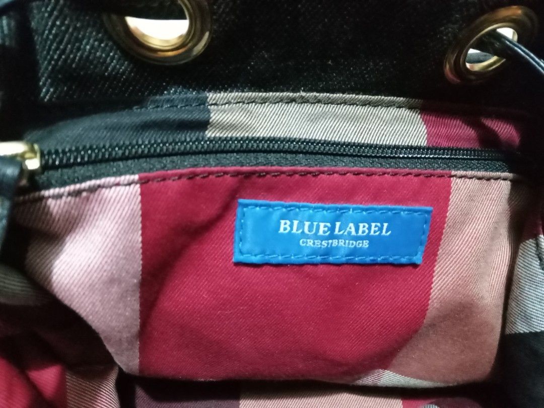 Burberry bucket bag (Category: Luxury Bags & Wallets) located in Manila. Submitted by monchiing (Listing ID 1290040949, Image 3). Description: burberry blue label bucket bag denim dark blue fabric will provide gold chain strap 9.5/10 bag condition.