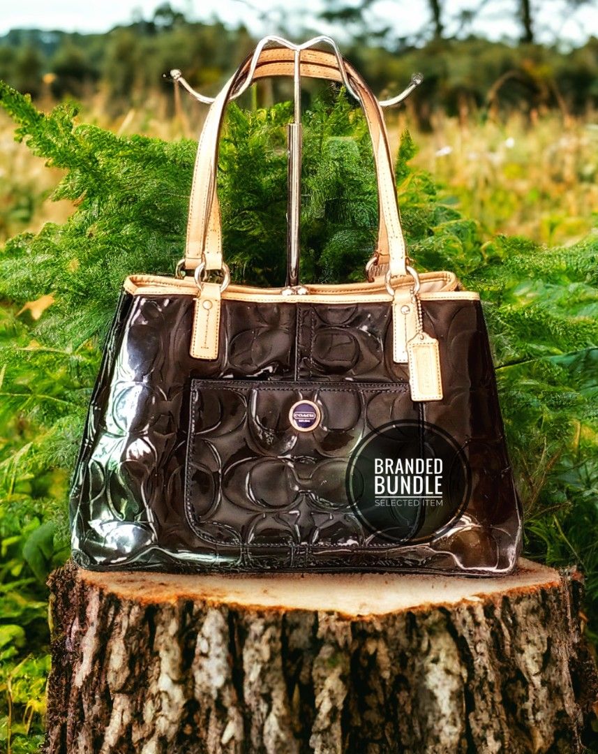 Embossed coach purse discount