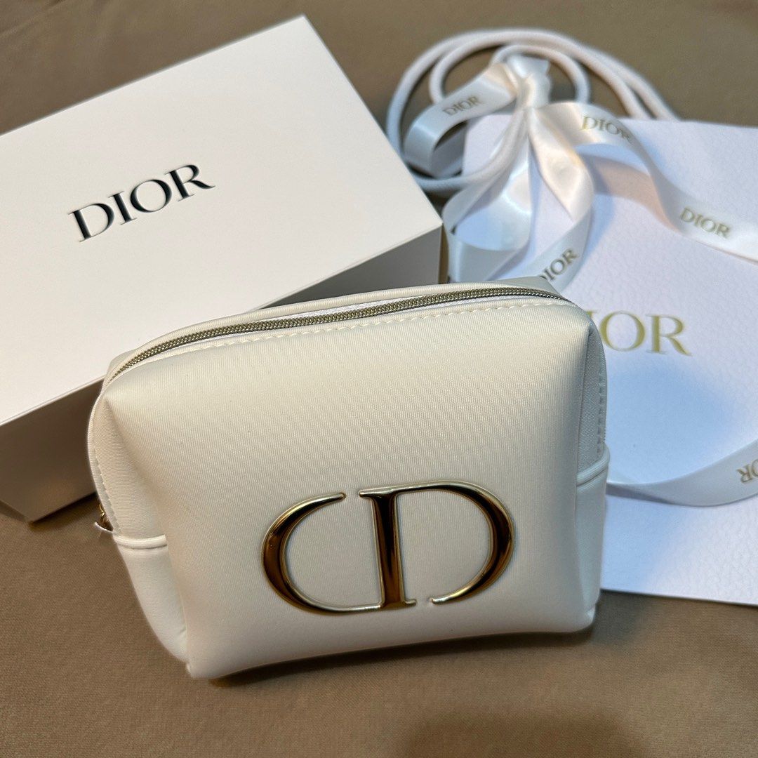 DIOR BEAUTÉ POUCH ORIGINAL (Category: Luxury Bags & Wallets) located in Rizal. Submitted by thetopspotfashionboutique (Listing ID 1290097266, Image 1). Description: ORIGINAL DIOR BEAUTÉ POUCH 🤍🐝 - complimentary gift / gift with purchase from Dior Beauté - can fit big phones, wallets and make ups 💄💋 - comes with box / brandnew - Measurement: 16x13x5cm.