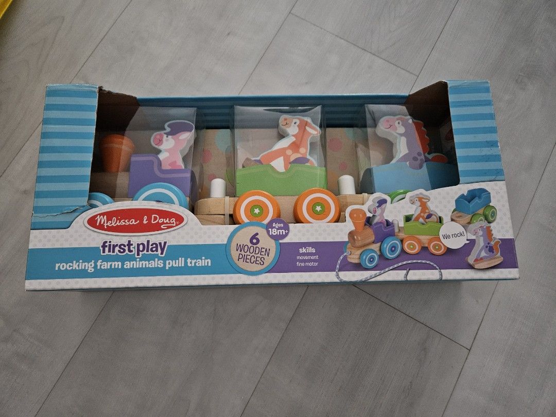 Melissa and doug rocking farm animals pull train on sale