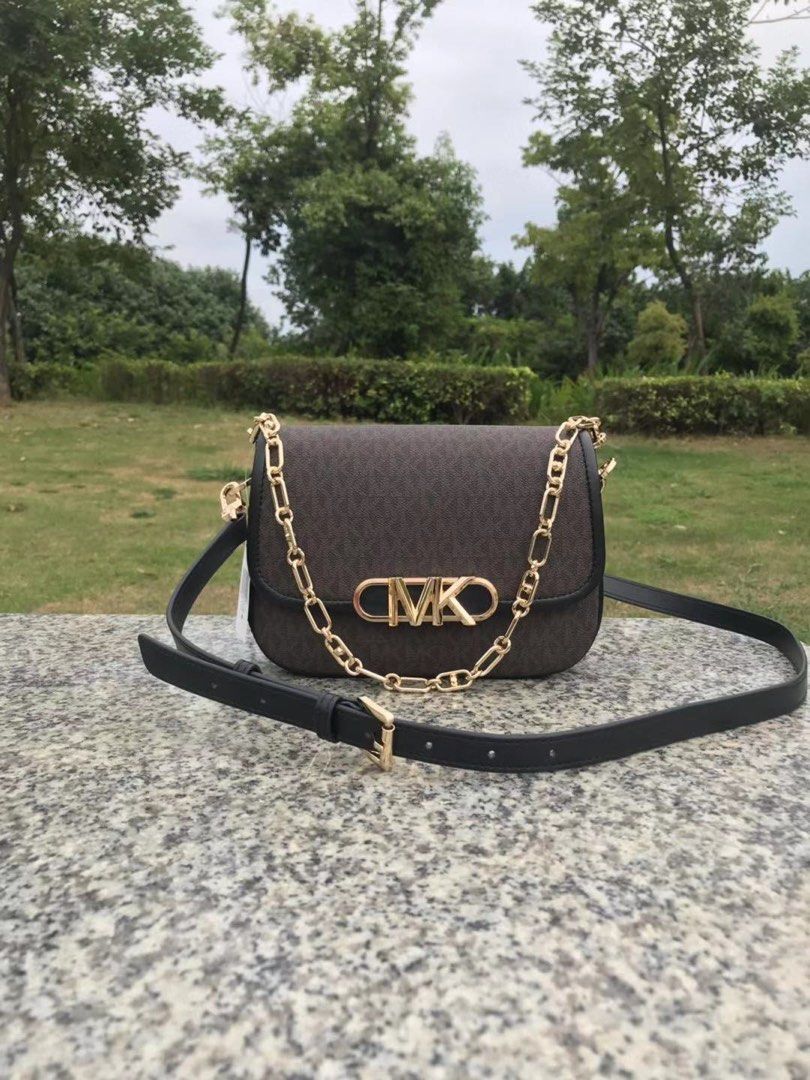 Mk sling bag white discount