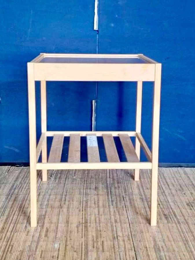 Ikea nesna side table (Category: Tables & Sets) located in Quezon City. Submitted by matetdevis13 (Listing ID 1289945692, Image 1). Description: Ikea Nesna Side Table 14”L x 15”W x 18”H Php 3000 Solid wood Glass top In good condition.
