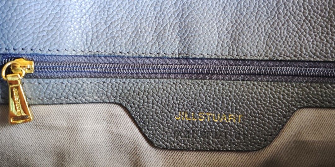 JILL STUART Top Handle Bag (Category: Luxury Bags & Wallets) located in Sariaya. Submitted by retro.stuff (Listing ID 1289952030, Image 3). Description: Hello. Selling this pretty and spacious bag to declutter. I bought this but wasn't able to actually use it. (What we call impulsive buying. 🤦🏽‍♀️) The plastic cover on the lock hasn't even been removed. It has an engraved code too for authentication. Has few folds and rubs due to storage but st