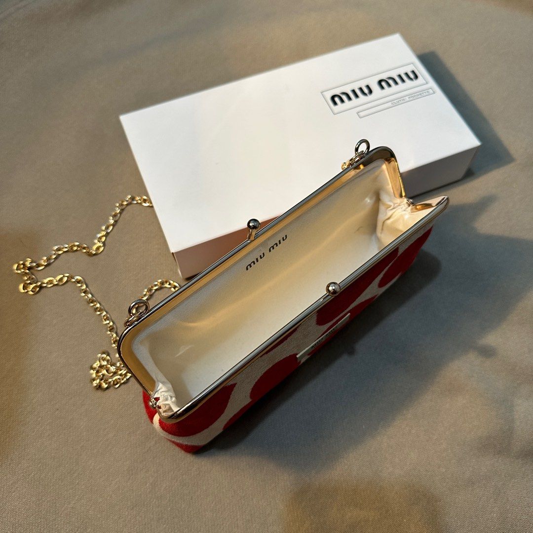 MIUMIU RED HEART SLING WALLET ❤️💄 (Category: Luxury Bags & Wallets) located in Rizal. Submitted by thetopspotfashionboutique (Listing ID 1290098193, Image 2). Description: - complimentary gift / gift with purchase from miumiu parfums 💄 - can fit big phones, wallets and make ups 💄💋 - comes with box.