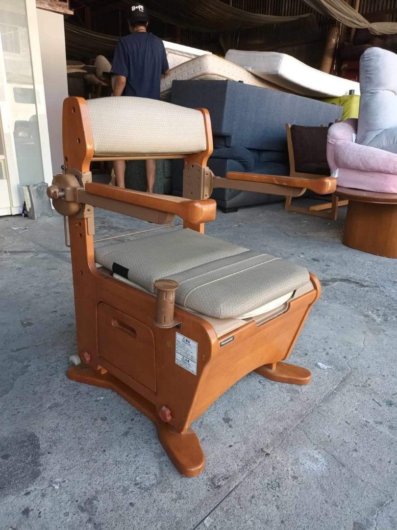 Panasonic commode chair (Category: Chairs) located in Quezon City. Submitted by matetdevis13 (Listing ID 1290009083, Image 3). Description: Panasonic commode chair / portable toilet Price : 4000 21L x 21W x 15H seat height inches Sandalan height 31 inches Solid wood In good condition Code akc 936.