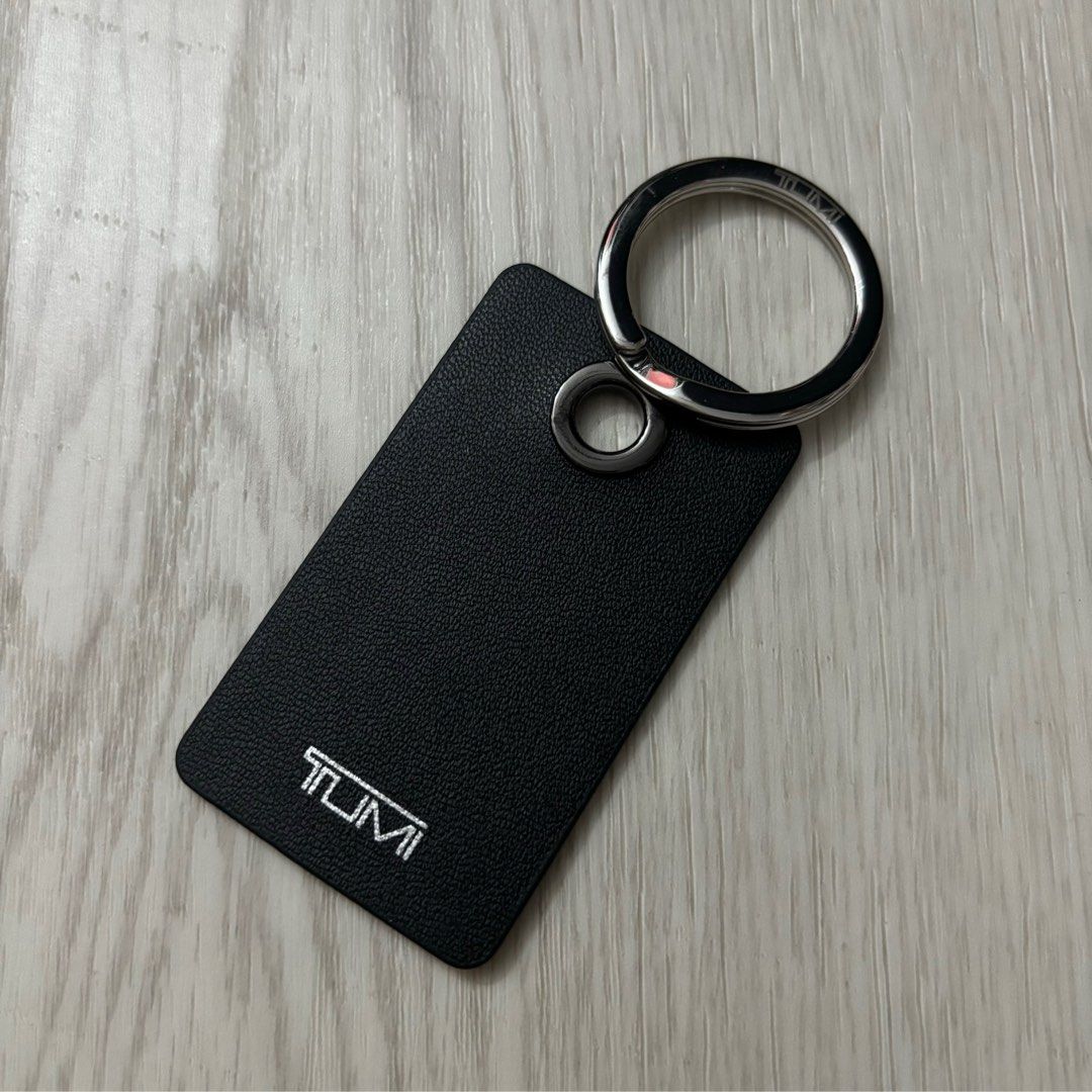 Tumi Key Ring with Initial Calfskin Black Leather Matte Black with Silver Logo Hobbies Toys Travel Travel Essentials Accessories on Carousell