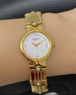 Raymond clearance weil olx