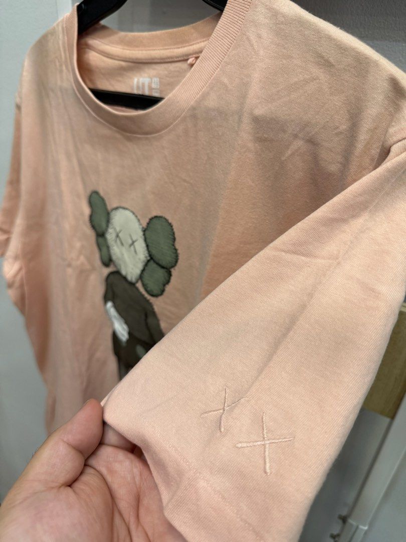 Uniqlo Kaws Pink Tee ( Large) (Category: Tshirts & Polo Shirts ) located in San Juan City. Submitted by danielnavvvvarro (Listing ID 1290181691, Image 3). Description: ‼️ READ ME ‼️ - too lazy to iron lol - dimes : L 28 x W 19 - Large on tag - Shipping shouldered by the buyer - MOP: Gcash/BPI - 2 days reservation MAX. - STRICTLY NO RETURNS, REFUNDS, CANCELLATIONS 📌COMING FROM BINONDO MANILA 📌SHIPPING SHOULDERED BY BUYER 📌CAN DO GRAB/LALAMOVE/ 