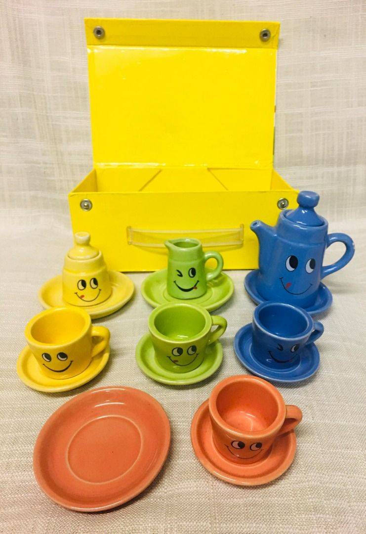 Vintage Ceramic Smiley Tea Set Toy (17 pcs.) (Category: Coffee & Tea Tableware) located in Taguig. Submitted by Bloomscorner1 (Listing ID 1290109224, Image 2). Description: ✅ A 17 pc. vintage ceramic tea set toy ✅ tallest blue tea pot size - approx. 2.75 inches/saucer size - 3.1 inches.