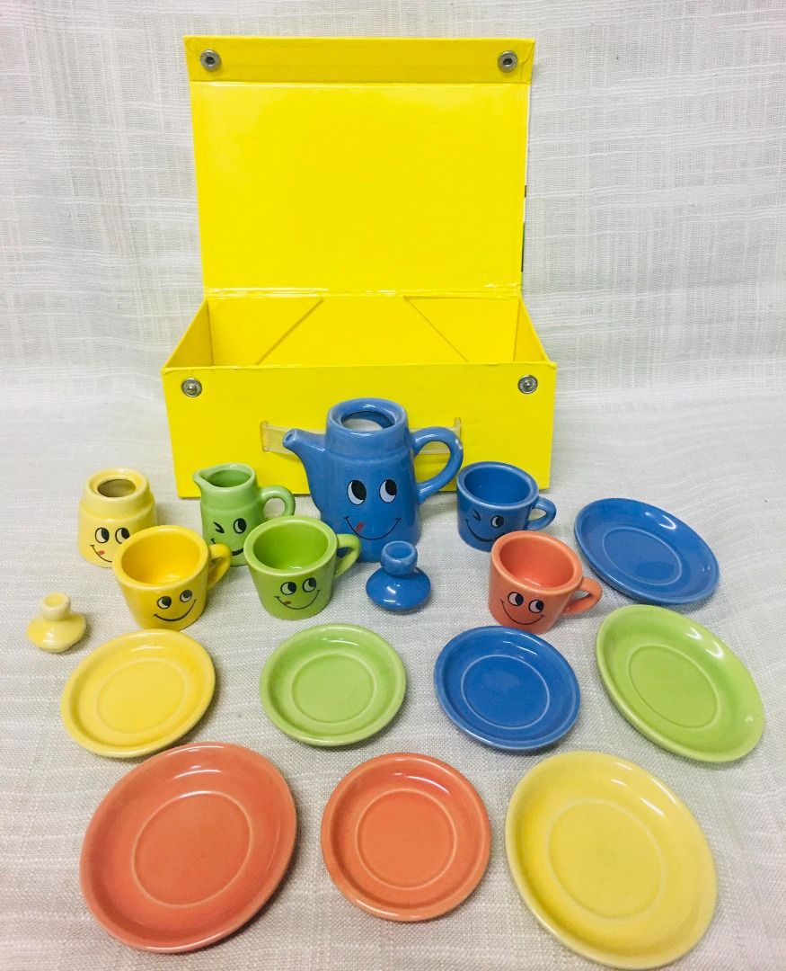 Vintage Ceramic Smiley Tea Set Toy (17 pcs.) (Category: Coffee & Tea Tableware) located in Taguig. Submitted by Bloomscorner1 (Listing ID 1290109224, Image 1). Description: ✅ A 17 pc. vintage ceramic tea set toy ✅ tallest blue tea pot size - approx. 2.75 inches/saucer size - 3.1 inches.