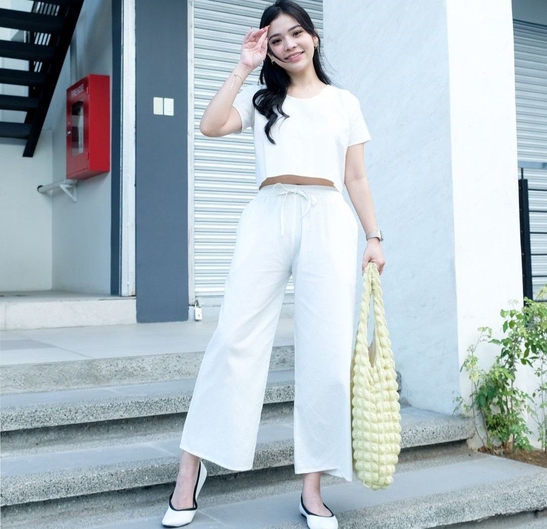 White Coordinates (Category: Sets or Coordinates) located in Borongan. Submitted by anything_goes_shop (Listing ID 1290212548, Image 2). Description: M-L cropped white top, wide leg white pants bust 36-38 waist 30-34.