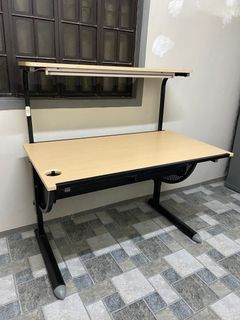 Wood laminated liftable Drawing/Drafting Table with installed light.