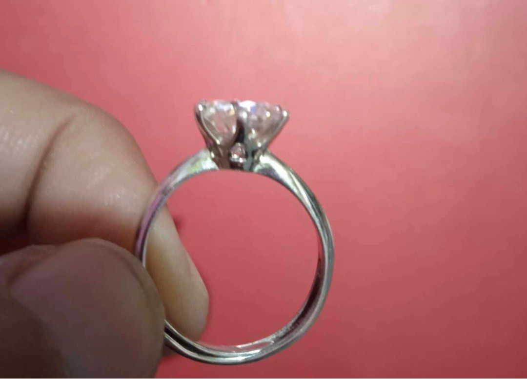 2ct. Moissanite Stone Engagement Ring S925 (Category: Rings) located in Caloocan City. Submitted by levres_good_collection07 (Listing ID 1290366416, Image 1). Description: 2.ct Moissanite Stone Engagement Ring 92.5 Sterling Silver Ring Size: Adjustable Stone size: 8mm Comes w/ Certificate Comes w/ Box.