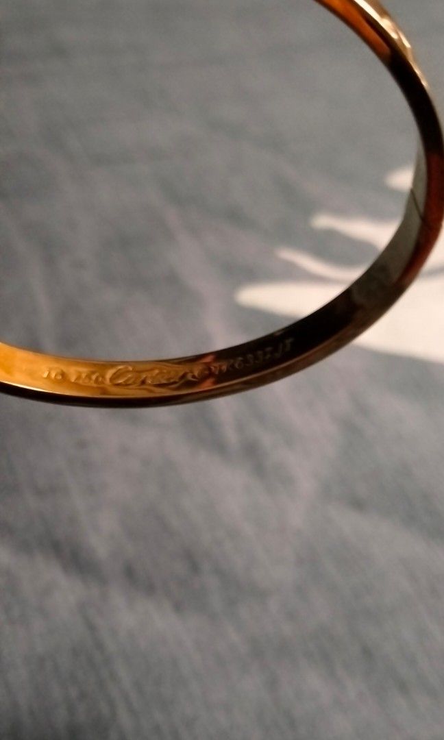 Bangle (Category: Accessories) located in Singapore. Submitted by wise_lady (Listing ID 1290340338, Image 3). Description: 18K Cartier bangle size: 16 cm weight: 7.73 gms.