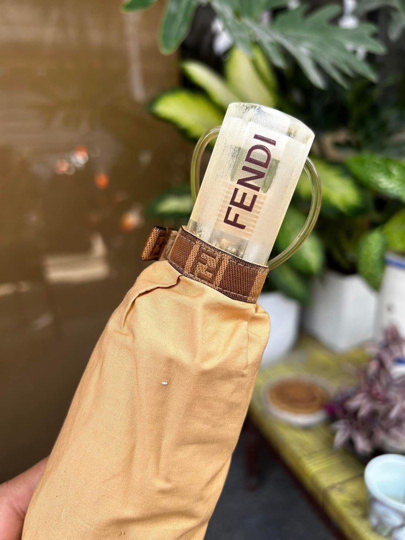 FENDI Vintage Umbrella (Category: Umbrellas) located in Quezon City. Submitted by whatsinmyclosett (Listing ID 1290341676, Image 3). Description: FENDI ORIGINAL Umbrella ☑️Item in Japan ☑️Very Good Condition ☑️manage your expectation this is second hand / Vintage Item Hindi Brand New Binibili mo! So Ganda in person Issue pay part lang ng madumi at tarnish ng harware check the photos., the umbrella is in very good condition! Fendi is fendi napaka 