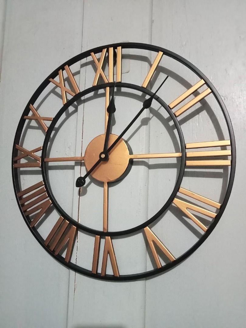 Large metal wall clock 40cm, 50cm, 60cm, 80cm (Category: Wall Decor) located in Caloocan City. Submitted by relique_boutique2026 (Listing ID 1290349180, Image 1). Description: Available size: 40cm, 50cm, 60cm, 80cm Color, Black, Black and gold, Gold, Copper gold Location: Caloocan South.