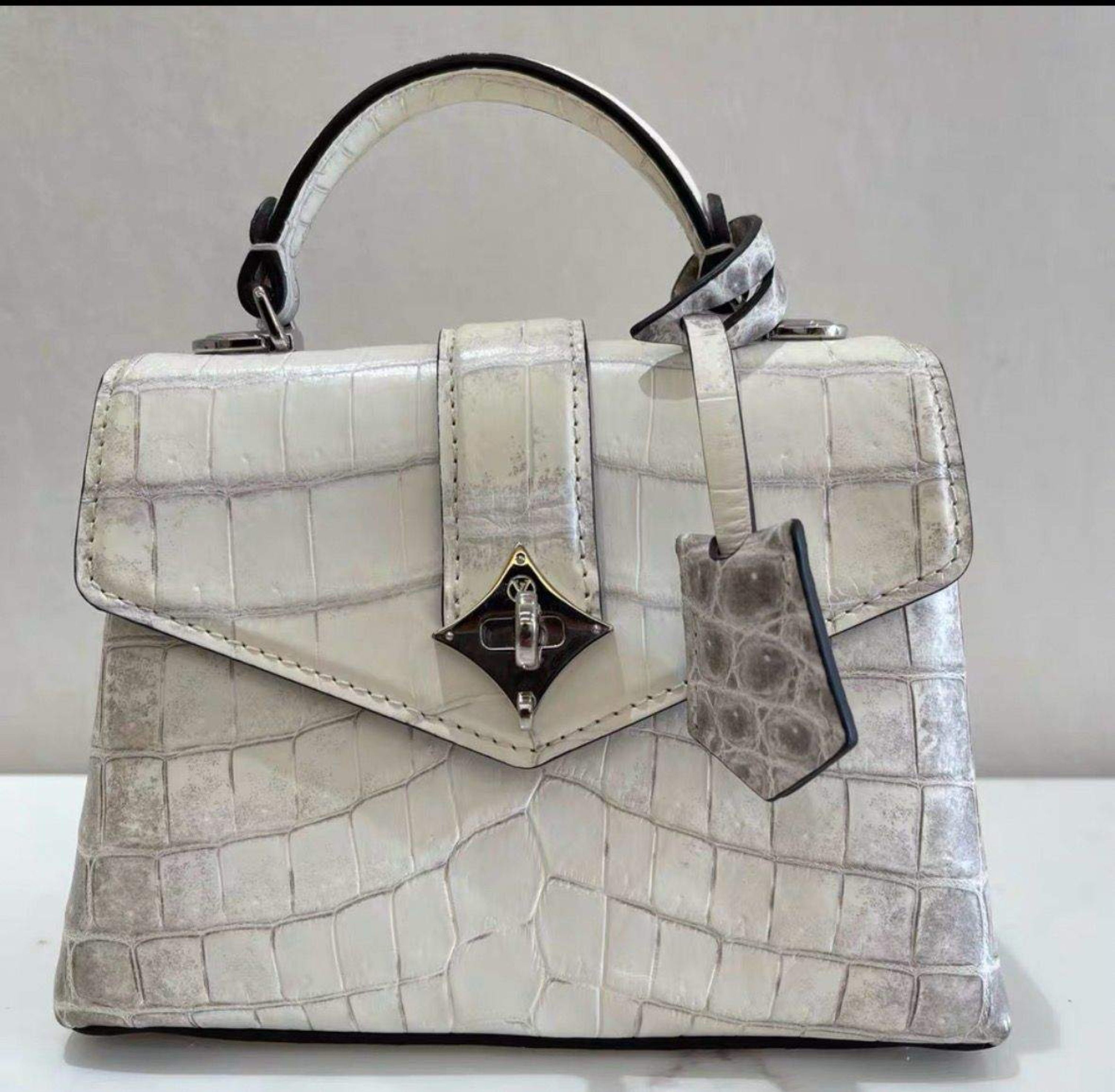 Louis vuitton crocodile deals
