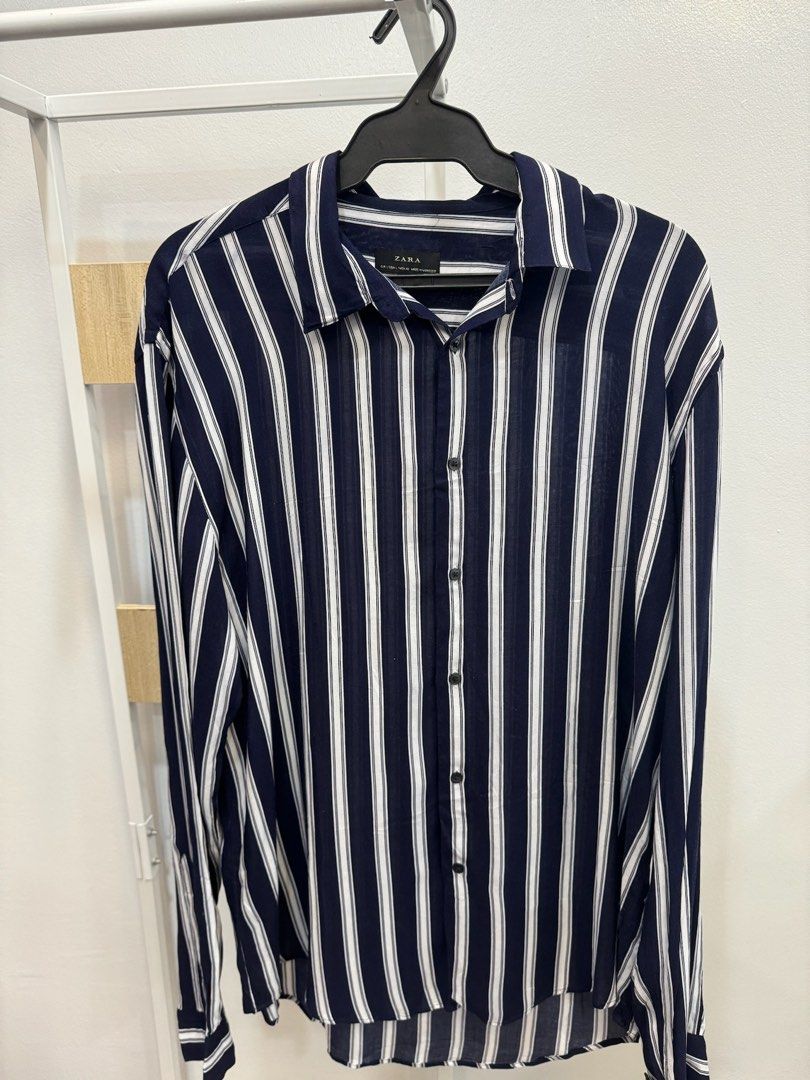 Zara Navy Blue Stripes Longsleeve (Category: Formal Shirts) located in San Juan City. Submitted by danielnavvvvarro (Listing ID 1290368945, Image 1). Description: ‼️ READ ME ‼️ - Dimes: L 30 x W 21 - Large on tag - Shipping shouldered by the buyer - MOP: Gcash/BPI - 2 days reservation MAX. - STRICTLY NO RETURNS, REFUNDS, CANCELLATIONS 📌COMING FROM BINONDO MANILA 📌SHIPPING SHOULDERED BY BUYER 📌CAN DO GRAB/LALAMOVE/ OTHER COURIERS 📌JT&T/ OTHERS