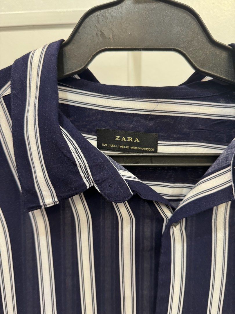 Zara Navy Blue Stripes Longsleeve (Category: Formal Shirts) located in San Juan City. Submitted by danielnavvvvarro (Listing ID 1290368945, Image 3). Description: ‼️ READ ME ‼️ - Dimes: L 30 x W 21 - Large on tag - Shipping shouldered by the buyer - MOP: Gcash/BPI - 2 days reservation MAX. - STRICTLY NO RETURNS, REFUNDS, CANCELLATIONS 📌COMING FROM BINONDO MANILA 📌SHIPPING SHOULDERED BY BUYER 📌CAN DO GRAB/LALAMOVE/ OTHER COURIERS 📌JT&T/ OTHERS