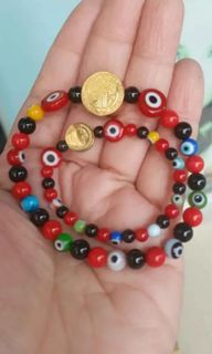 Anti usog Italy corals, black onyx ,evil eye with St. Benedict protection mother & child bracelet