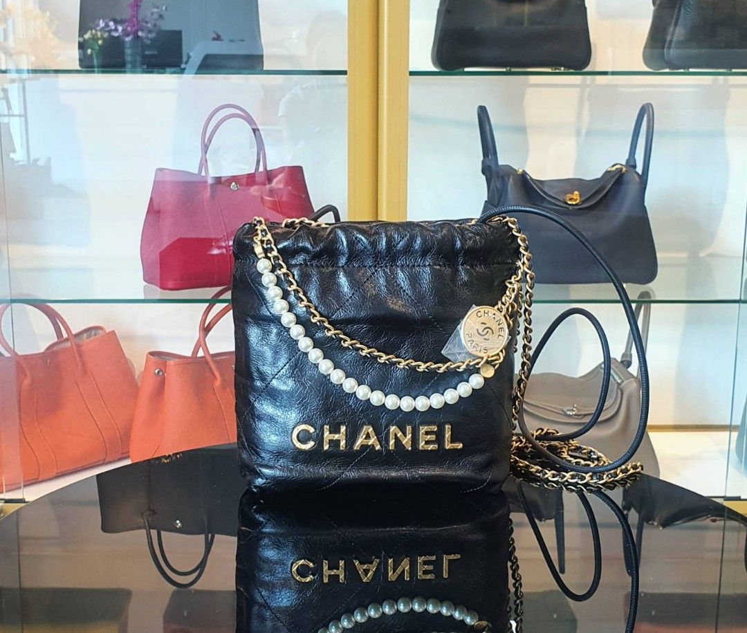 Chanel bag metal plate deals