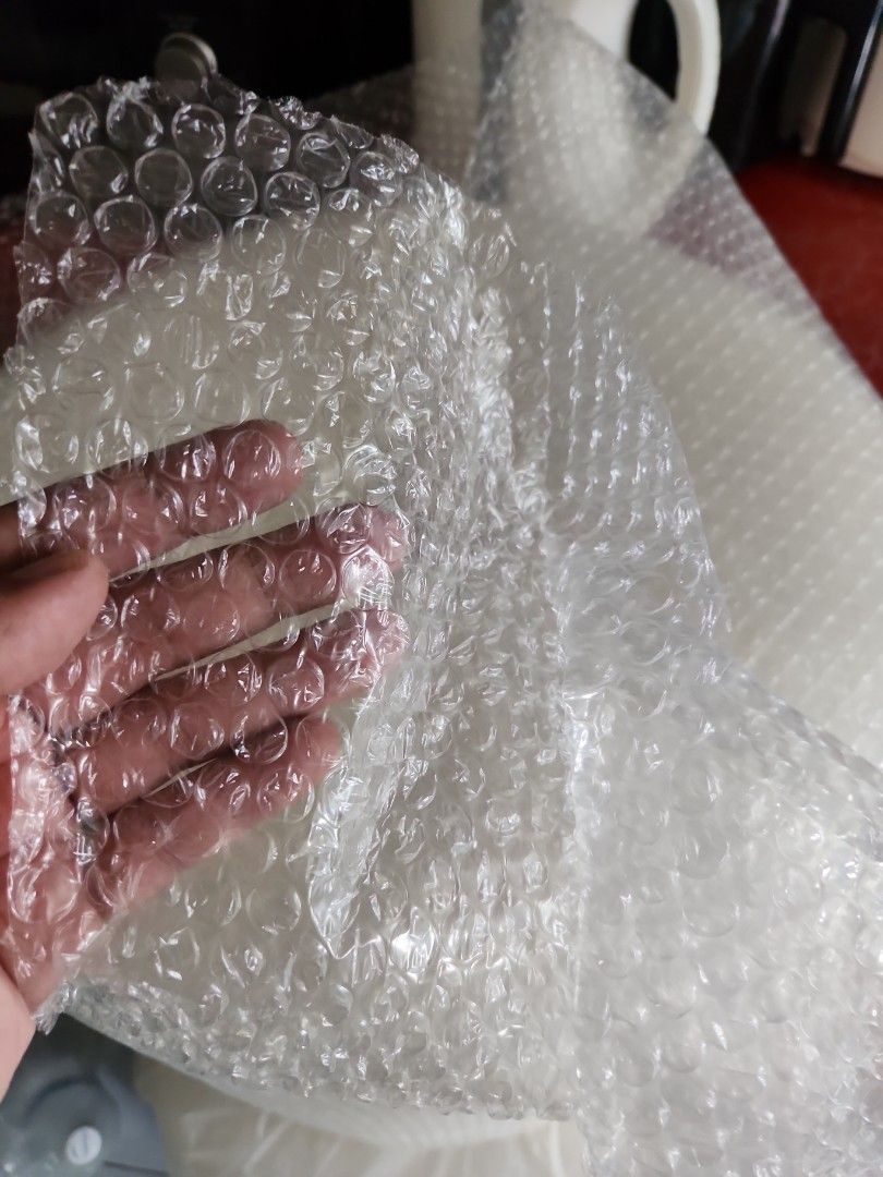 Bubble Wrap (Category: Other Stationery & Craft) located in Singapore. Submitted by verified.singapore.dealer (Listing ID 1284030998, Image 1). Description: 2 rolls 1 used half $12 1 new roll $25 20inch x 90m.