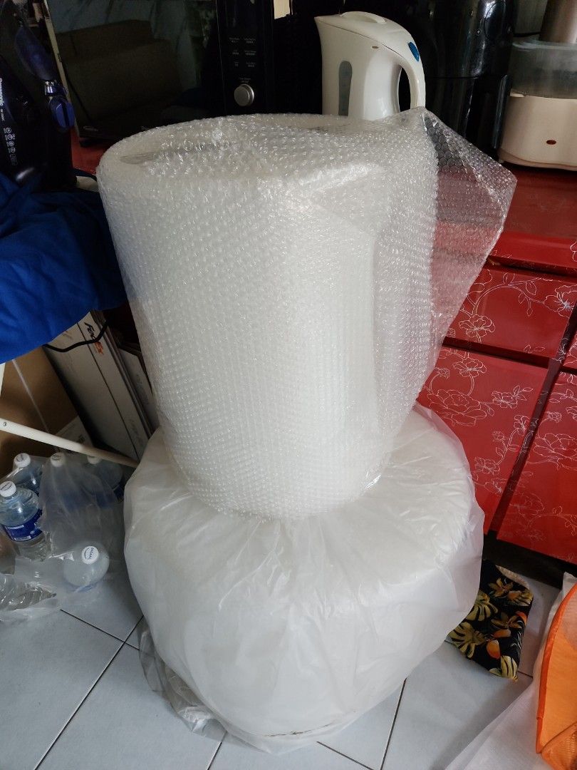 Bubble Wrap (Category: Other Stationery & Craft) located in Singapore. Submitted by verified.singapore.dealer (Listing ID 1284030998, Image 2). Description: 2 rolls 1 used half $12 1 new roll $25 20inch x 90m.