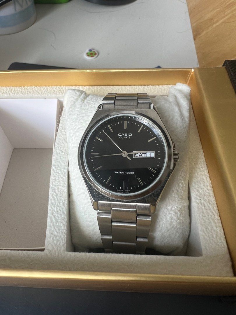 Casio Quartz MTP 1240 Black dial with day date