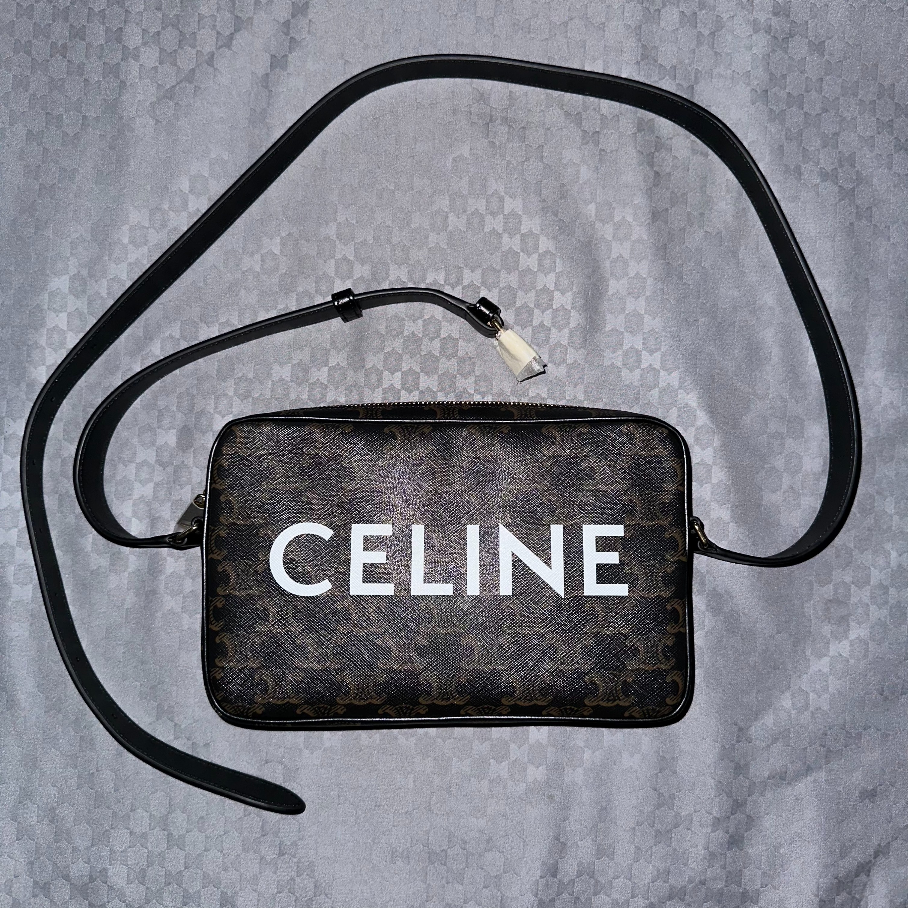 MEDIUM MESSENGER BAG IN TRIOMPHE CANVAS WITH CELINE PRINT - BLACK