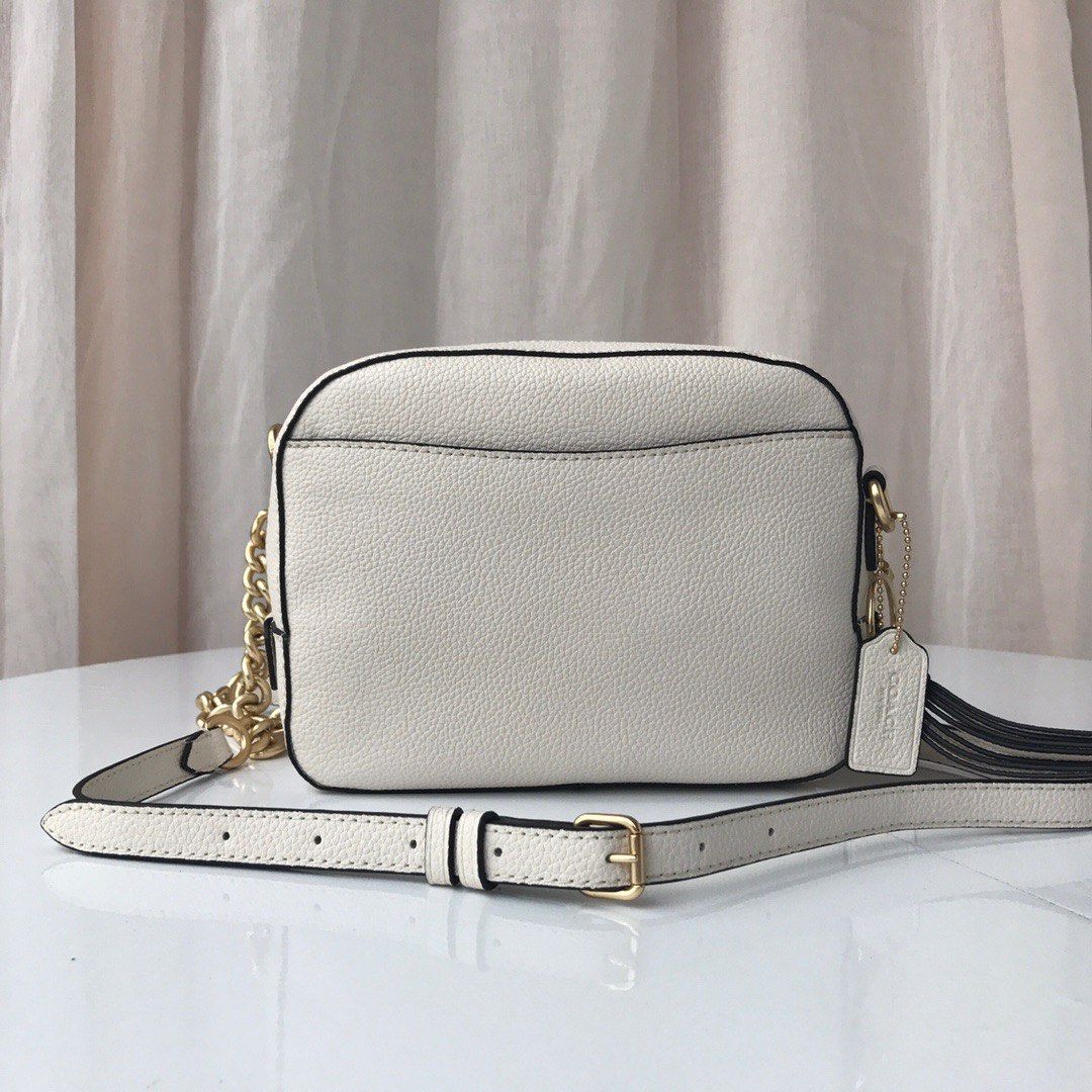 Coach white sling bag hotsell