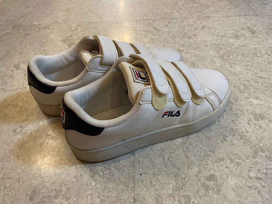 White and gold fila trainers 2025
